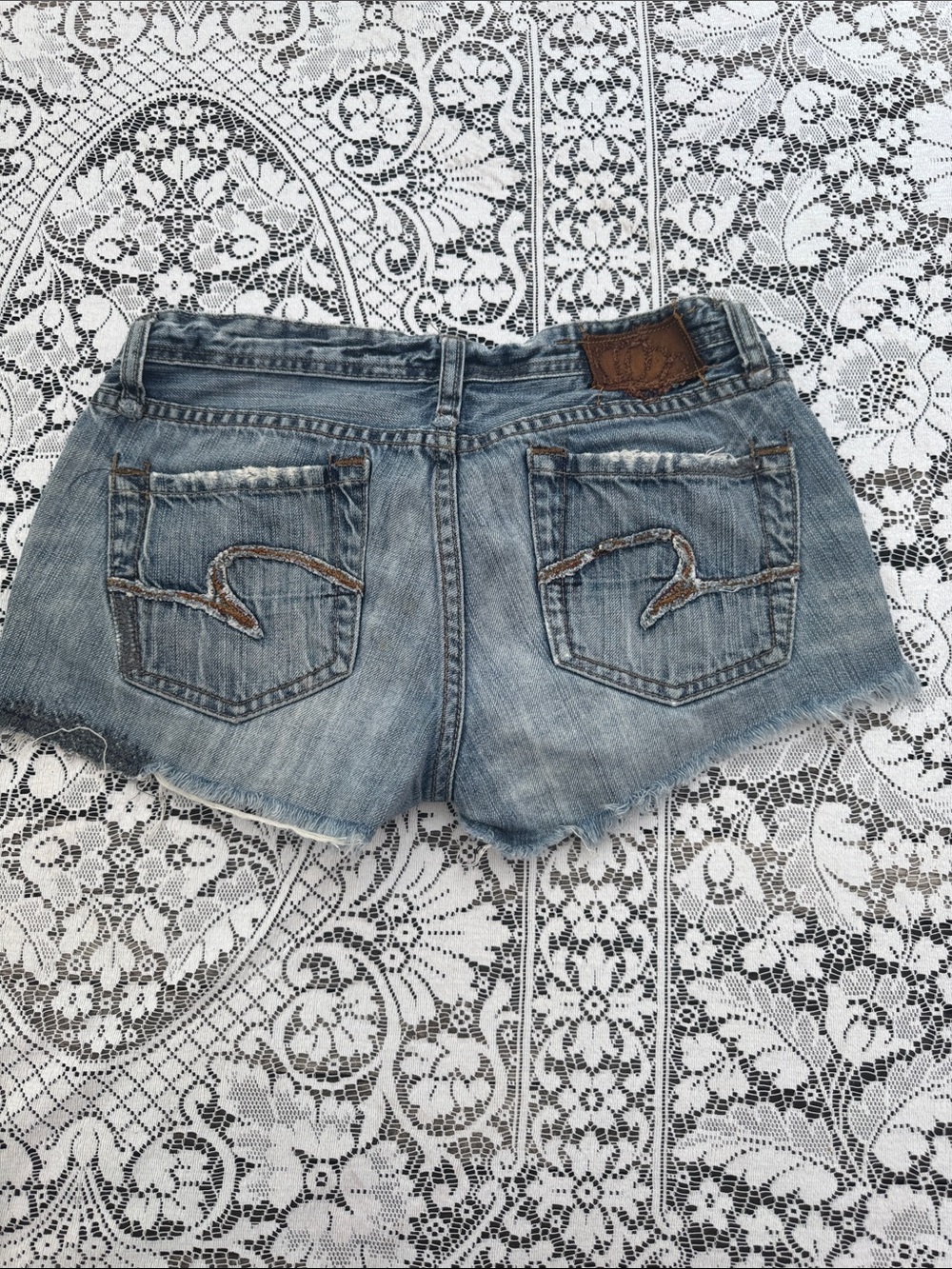 Womens Light Wash Denim Cutoff Shorts with Frayed Hem